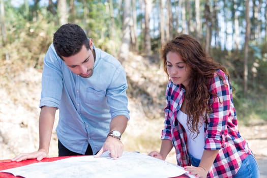 Young couple on roadtrip through countryside