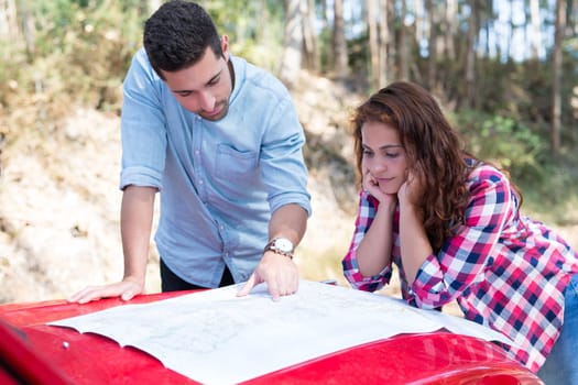 Young couple on roadtrip through countryside