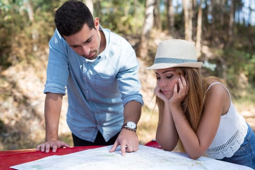 Young couple on roadtrip through countryside