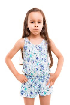 Small girl playing and making a silly expression - isolated over white