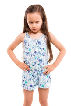 Studio shot of a mad young girl - isolated over white