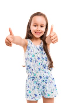 Small girl showing thumbs up, isolated over white background