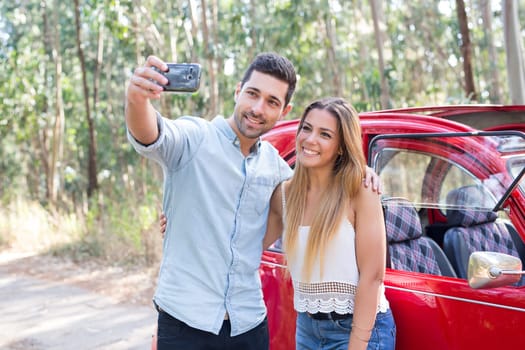 Young couple on roadtrip through countryside