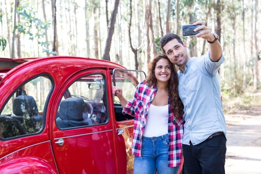 Young couple on roadtrip through countryside