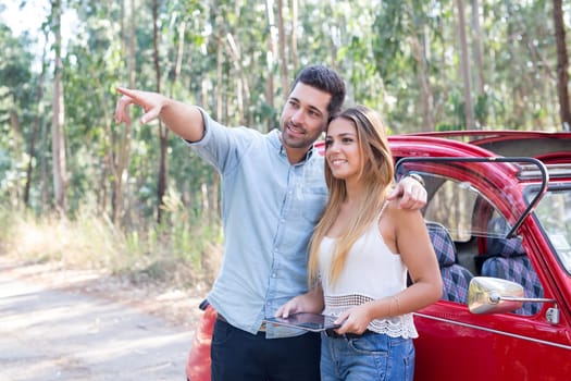 Young couple on roadtrip through countryside