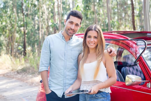 Young couple on roadtrip through countryside