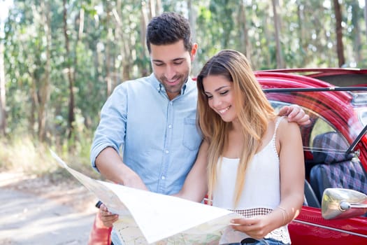 Young couple on roadtrip through countryside