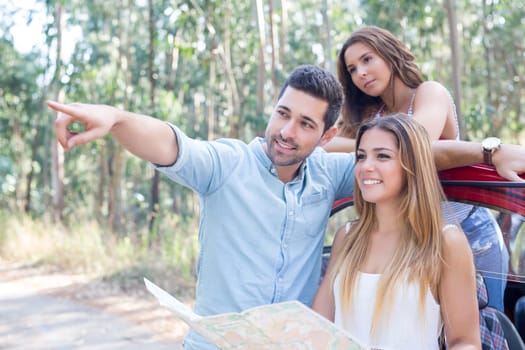 Group of friends on a roadtrip through countryside