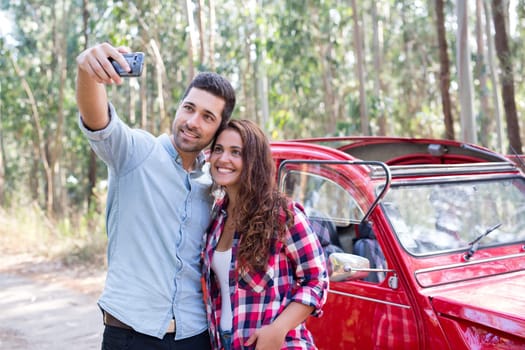Young couple on roadtrip through countryside