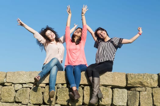 A group of students relaxing at the park