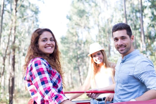 Group of friends on a roadtrip through countryside