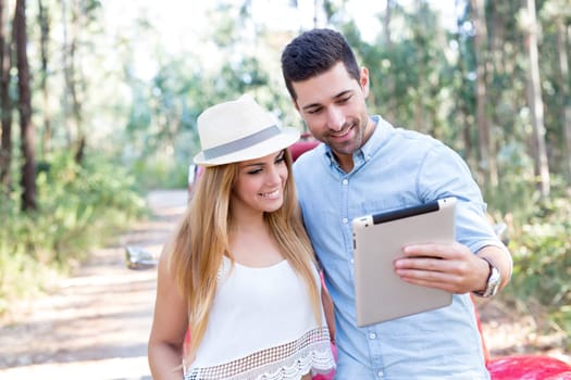 Young couple on roadtrip through countryside