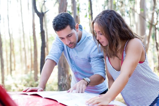 Young couple on roadtrip through countryside