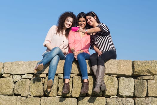 A group of students relaxing at the park