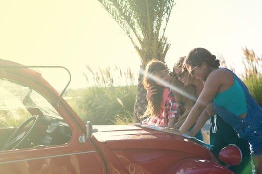 Group of friends on a roadtrip through countryside