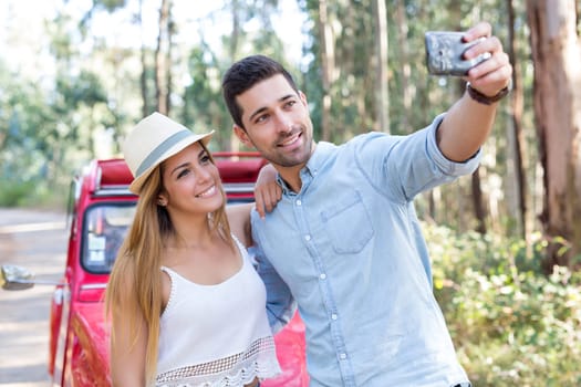 Young couple on roadtrip through countryside