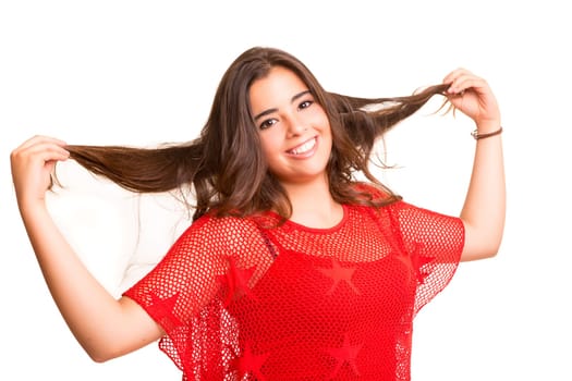 Happy woman pulling her hair, isolated over a white background