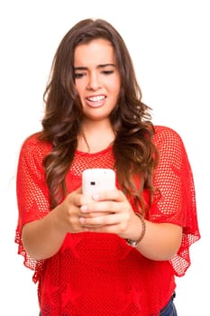 Teenager with cellphone, posing over a white background