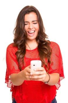 Teenager with cellphone, posing over a white background