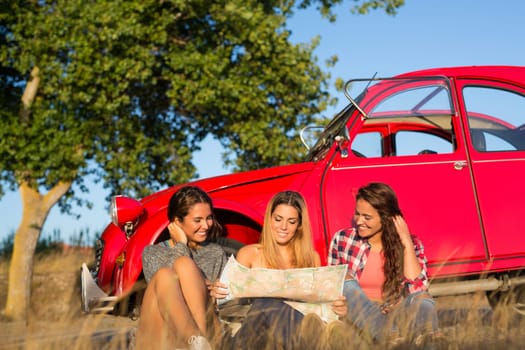 Group of friends on a roadtrip through countryside