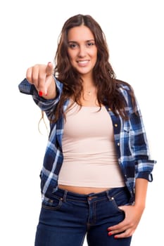 Young beautiful woman pointing at you, isolated over white