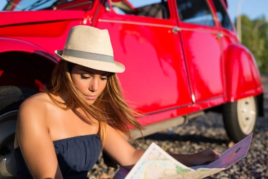 Woman going on a roadtrip in her convertible car