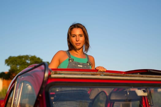 Woman going on a roadtrip in her convertible car