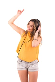 Happy young woman listening to music
