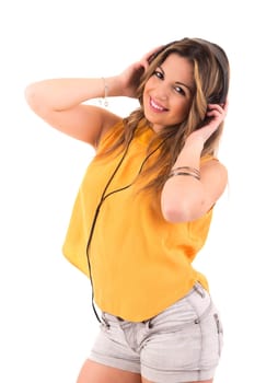 Happy young woman listening to music