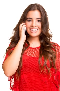 Teenager with cellphone, posing over a white background