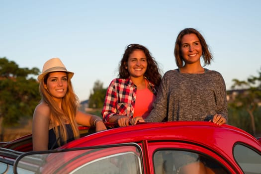 Group of friends on a roadtrip through countryside
