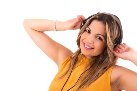 Happy young woman listening to music
