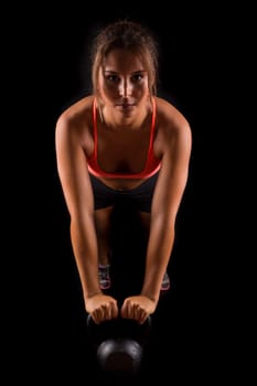 A beautiful young woman exercising - fitness concept