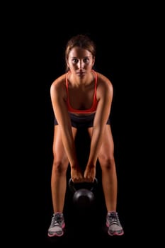 A beautiful young woman exercising - fitness concept
