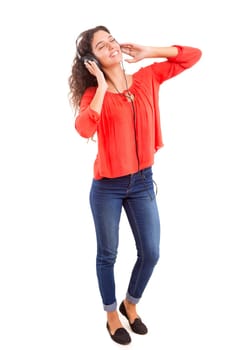 A Happy young woman listening to music