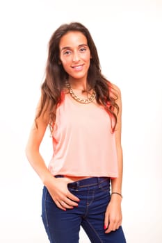 Beautiful young woman posing isolated over white background