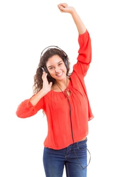 A Happy young woman listening to music