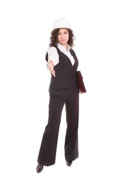 Young businesswoman, offering handshake - focus on hand
