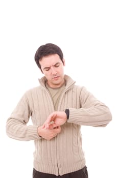 Young man consulting his watch, isolated over white