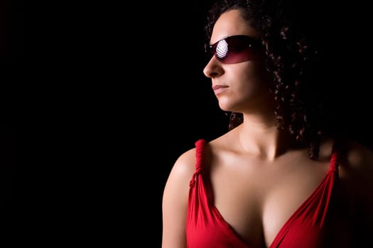 Young girl with sunglasses portrait - low key portrait
