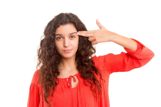 Young student tired of studying for the final exams, isolated over a white background