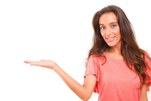 Young beautiful woman presenting your product, isolated over white background
