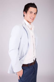Young casual boy posing isolated
