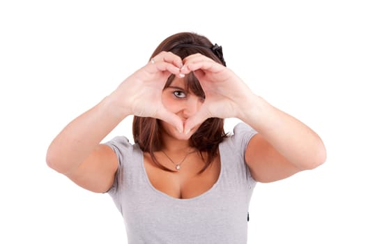 form of heart shaped by the hands of a young woman