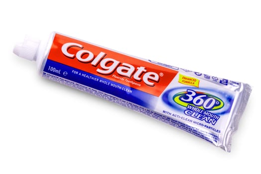 Kamchatka, Russia -May 13, 2019 : Colgate tooth paste on white.Colgate is a brand of toothpaste produced by Colgate-Palmolive