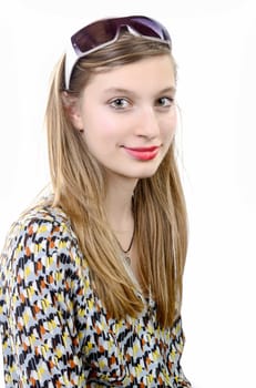 portrait of a smiling teenage girl with glasses