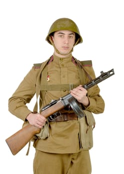 young Soviet soldier with machine gun on the white background