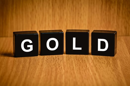 gold text on black block