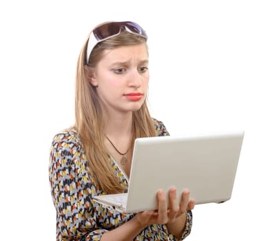 teenage girl with a laptop on the white background