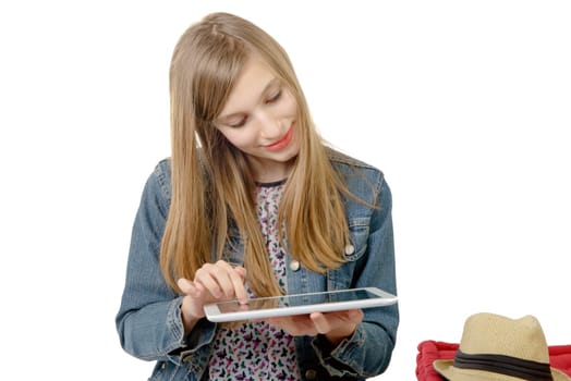 teenage girl with a digital tablet on the white background